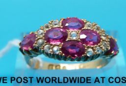 An 18ct gold ring set with rubies (Chester,