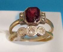 A yellow metal ring set with three diamonds and a yellow metal ring marked 9ct gold