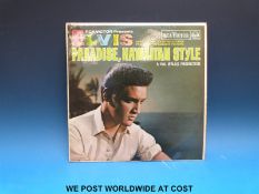 A collection of about 65x records including 45x LPs and 3x 7” singles by Elvis Presley and 7x LPs