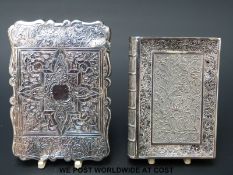 A shaped Victorian hallmarked silver card case and a filigree case modelled as a book