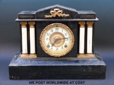 A late 19thC mantel clock in classical style with chapter ring and American movement