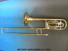 A trombone by Saramande in case,