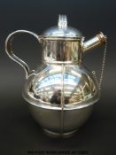 An unusually large Victorian hallmarked silver Guernsey cream jug with stopper on suspension chain,