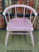 A small painted child's or doll's Windsor chair