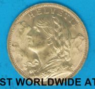 A cased 1935 'B' Swiss 20 Franc gold coin