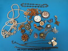 A hallmarked silver Dennison cased pocket watch, yellow metal mourning brooch, pearl necklace,