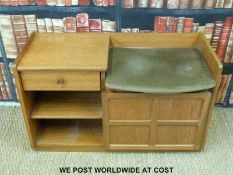 A retro telephone seat with fitted drawer and shelf unit and panelled cupboard together with a