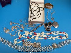 A quantity of jewellery to include white metal bracelet and matching necklace made up of circular