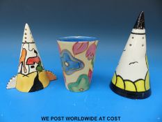 A Clarice Cliff bizarre beaker and two Art Deco style sifters