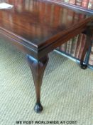 A mahogany coffee table raised on cabriole legs by Archer & Smith Ltd (L117 x D57 x H45cm)
