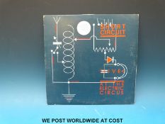 A small collection of 7x collectable 10” and 12” punk singles,