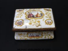 An 18thC sarcophagus shaped enamel patch box with central cartouche of sweethearts surrounded by