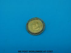 A 14ct gold brooch set with a Dutch coin to commemorate the birth of Prince Willem Alexander in
