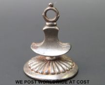 A large 18thC cut steel armorial fob with Latin inscription 'Causa Cecid', 3.5cm tall, 2.
