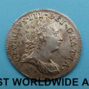 A VF George III 1787 sixpence,