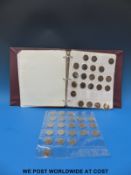A coin album containing an amateur collection of English coins, including pennies Victoria onwards,