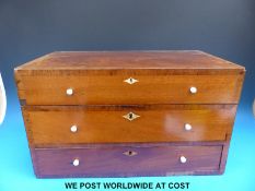 A Georgian mahogany and cross-banded campaign or travelling apothecary chest with hinged top