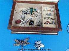 A quantity of jewellery to include two silver rings, one set with a moonstone,
