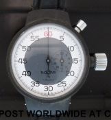 Rocar stopwatch with subsidiary seconds hand, grey and white dial, in black plastic case,