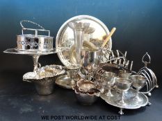 A large collection of silver plated ware to include tazza, toast racks,