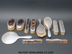 A six-piece hallmarked silver dressing table set with two pairs of hallmarked silver and