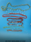 A coral necklace, pearl and malachite necklace,