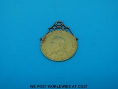 An 1887 Queen Victoria Jubilee head double sovereign in mount (17g)