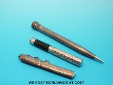 An unmarked white metal pencil,