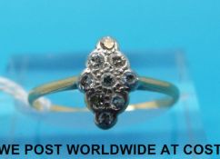 An 18ct gold ring set with diamonds in a navette shaped setting (size J)