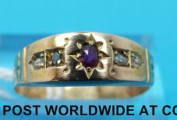 An Edwardian ring set with a ruby and rose cut diamonds (size N)