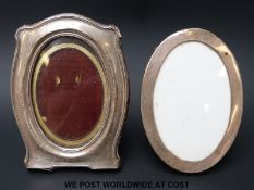 Two oval hallmarked silver photograph frames,