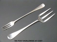 An early 20th century hallmarked silver serving fork,