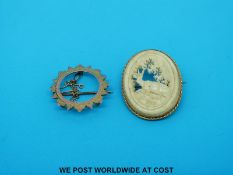 A 9ct gold brooch and a yellow metal brooch set with bone