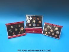 Five deluxe cased leather bound UK coin sets, 1983,