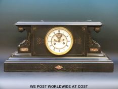A Victorian black slate mantel clock with Brocot escapement