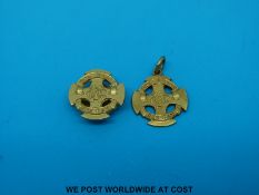A 9ct gold fob reading 
