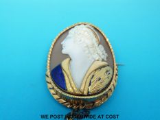 A French 18ct gold brooch set with a large cameo of young woman,