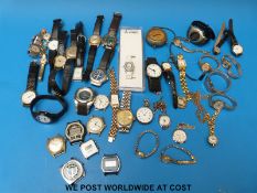 A large collection of ladies' and gentleman's wristwatches together with a continental silver