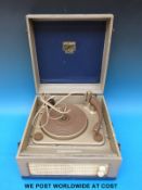 A Dansette portable record player in blue finish