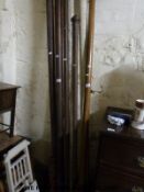 A collection of 19thC / 20thC curtain poles of substantial size,