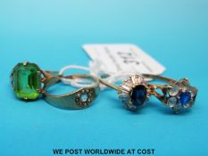 Three 9ct gold rings and a yellow metal ring marked 10ct gold set with seed pearls