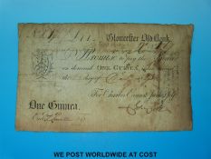 A Georgian Gloucester Old Bank note for one guinea dated 1767