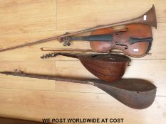 A violin and bow mandolin,