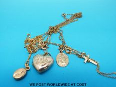 Four 9ct gold chains, a 9ct gold St Christopher,