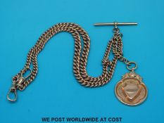A 9ct rose gold graduated double Albert chain and fob (52.