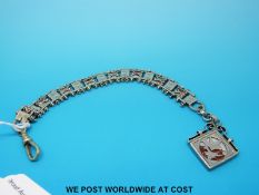 A white metal fob watch chain set with sections of mother of pearl and sunstone