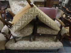A 19thC upholstered inlaid walnut framed sofa with two similarly upholstered chairs