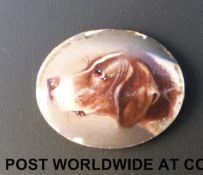 A late 18th / 19thC enamel miniature of an English Pointer or spaniel,