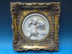 A carved marble/alabaster plaque,