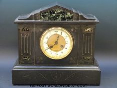 A late 19th century black slate mantel clock in classical style,